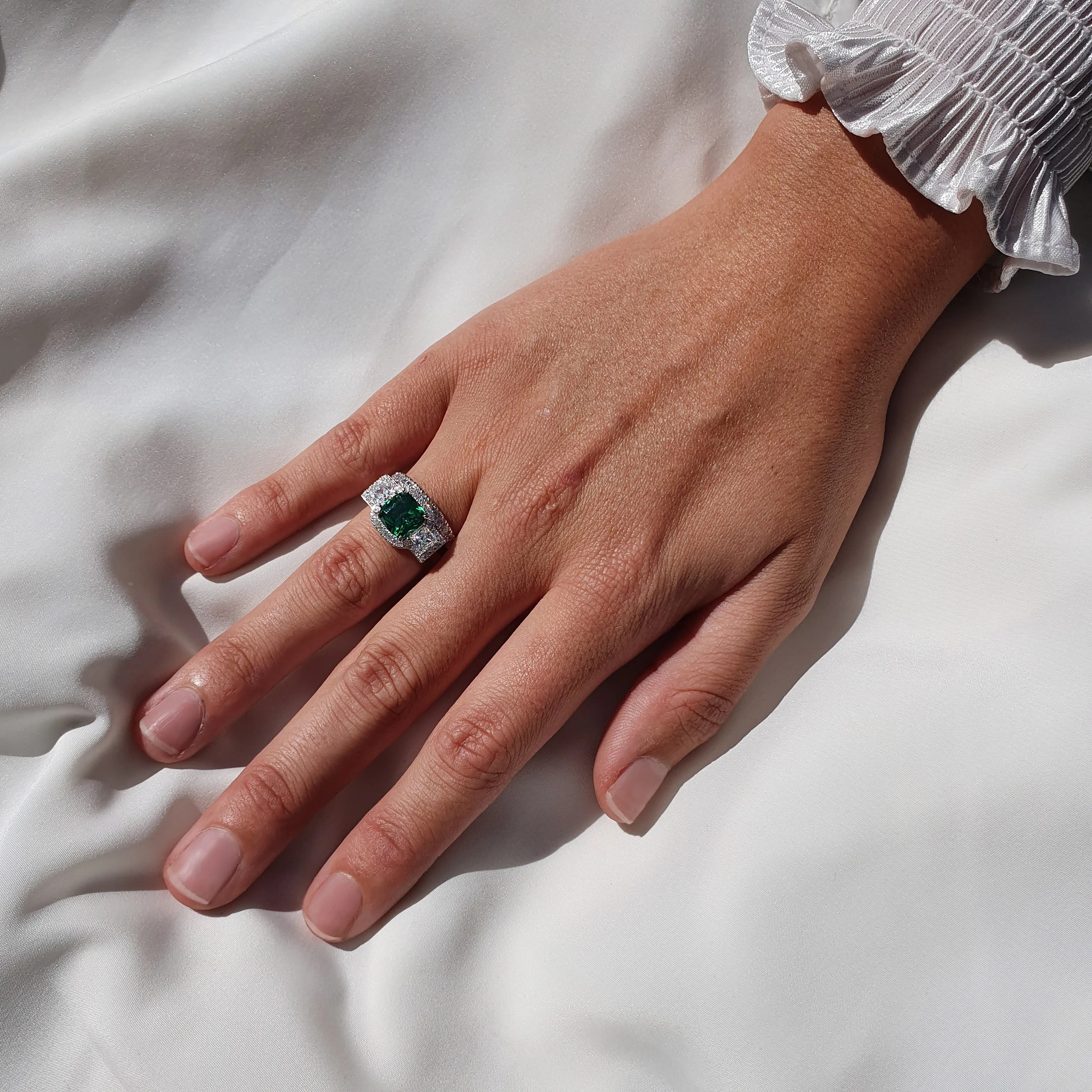 Dress ring with emerald simulant and 0.99 carats* of diamond simulants in sterling silver