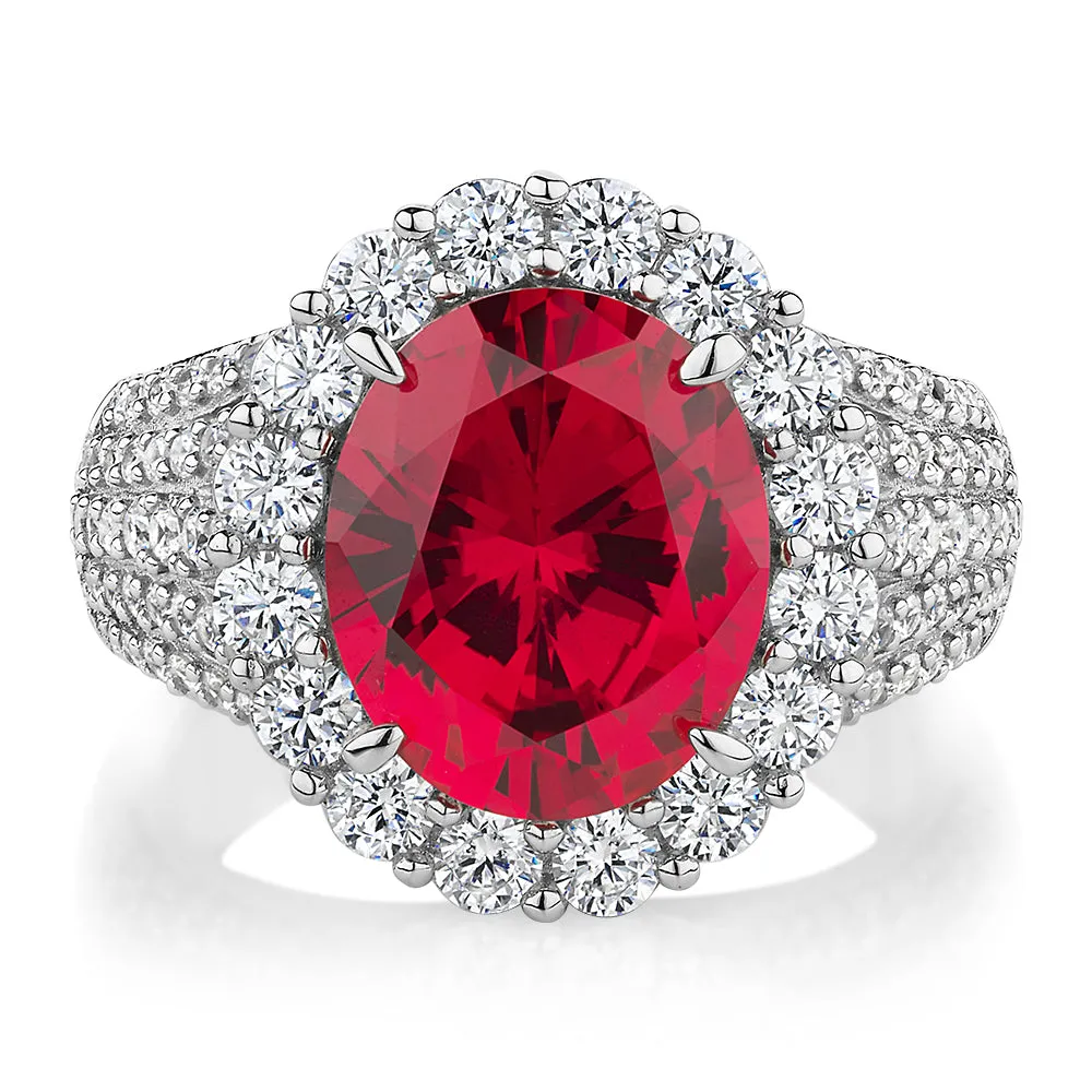 Dress ring with ruby simulant and 1.83 carats* of diamond simulants in sterling silver