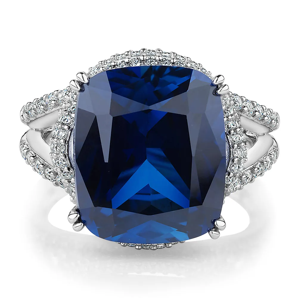 Dress ring with sapphire simulant and 0.92 carats* of diamond simulants in sterling silver