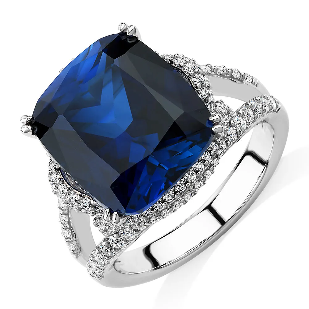 Dress ring with sapphire simulant and 0.92 carats* of diamond simulants in sterling silver